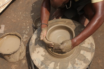 clay potter, clay molding, man plotter