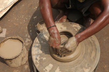 clay potter, clay molding, man plotter