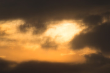 abstract background with the sunshine and black clouds