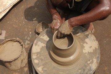 clay potter, clay molding, man plotter