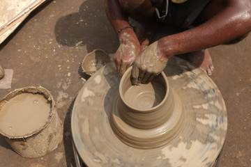 clay potter, clay molding, man plotter