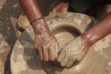 clay potter, clay molding, man plotter