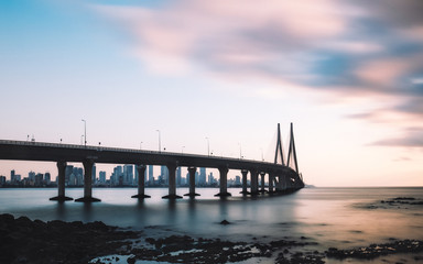 Sea link bridge and Mumbai skyline at sunset