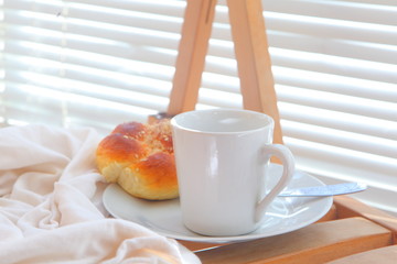 Breakfast. Black coffee with pastries