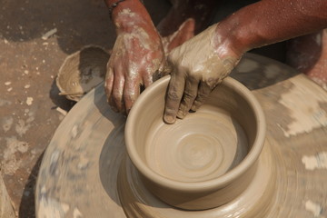 Potter at work, clay molding, man work clay, potter man