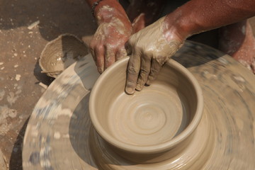 Potter at work, clay molding, man work clay, potter man