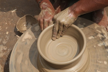 Potter at work, clay molding, man work clay, potter man