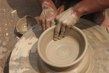 Potter at work, clay molding, man work clay, potter man