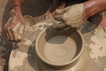 Potter at work, clay molding, man work clay, potter man