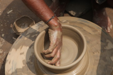 Potter at work, clay molding, man work clay, potter man