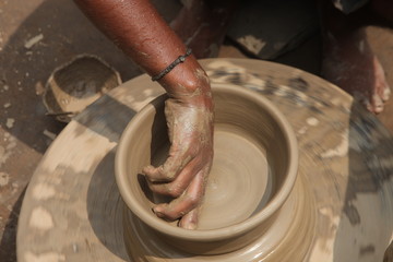 Potter at work, clay molding, man work clay, potter man