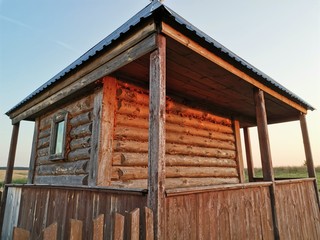 old wooden house in the field