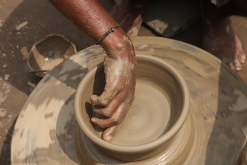 Potter at work, clay molding, man work clay, potter man
