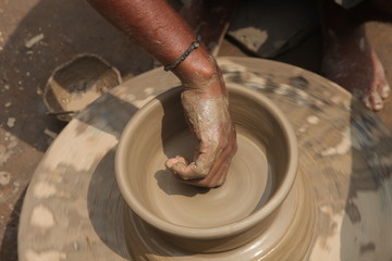 Potter at work, clay molding, man work clay, potter man