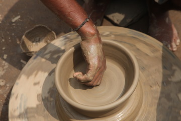 Potter at work, clay molding, man work clay, potter man