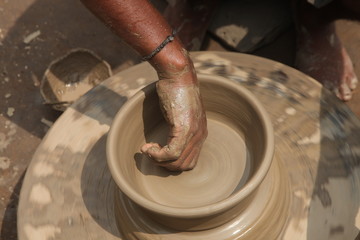 Potter at work, clay molding, man work clay, potter man