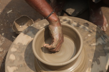 Potter at work, clay molding, man work clay, potter man