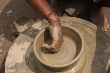 Potter at work, clay molding, man work clay, potter man