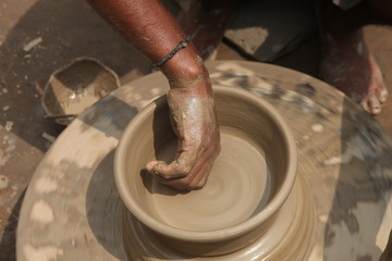 Potter at work, clay molding, man work clay, potter man
