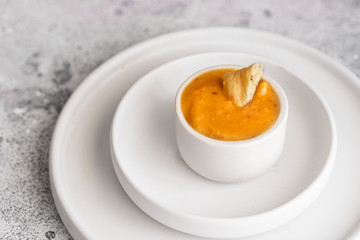 Almogrote, famous La Gomera cheese paste, in white ceramic bowl. Its popular appetizer served in many restaurants in Canary Islands
