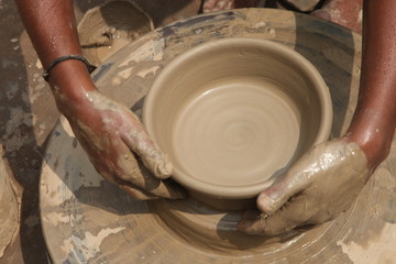 Potter at work, clay molding, man work clay, potter man