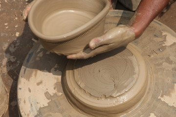 Potter at work, clay molding, man work clay, potter man