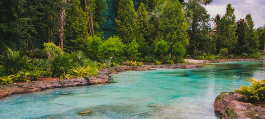 beautiful stream of blue water from a natural spring in Orlando Florida downtown  Disney stream...