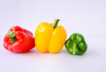 Red bell sweet pepper on white background