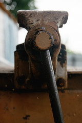 metal old vise tool set on rusty layout