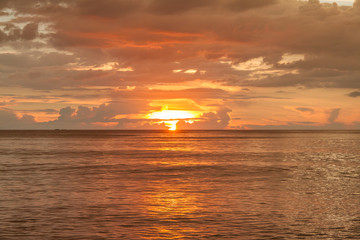Fototapeta na wymiar Bronze sunset on the Andaman sea, Kamala beach, Phuket, Thailand