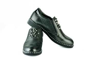 Women's red shoes from a varnish on a white background