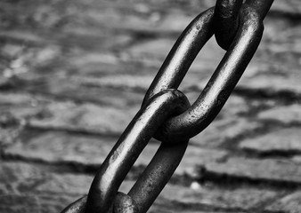 Black and white iron link