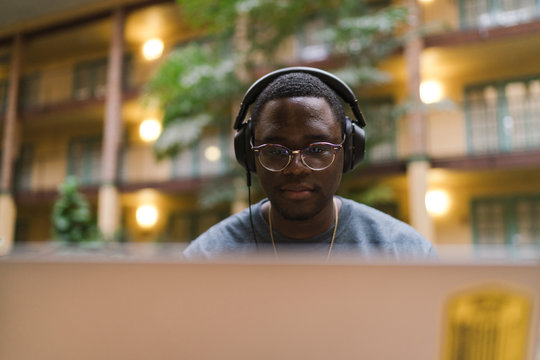 Young man wearing eyeglasses and headphones