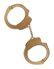 There is a pair of golden handcuffs. White background. Isolated.