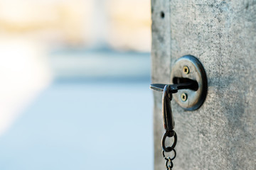 a key is inserted in the keyhole, the doors are open to the outside