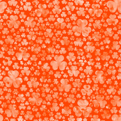 Watercolor orange clover leaves on orange background. St.Patrick's Day. Seamless pattern. Watercolor stock illustration. Design for backgrounds, wallpapers, covers, textile, packaging.