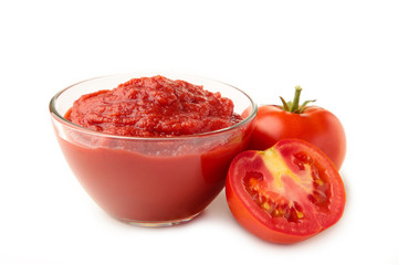 Fresh tomatoes with paste isolated on white background