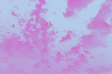 Pink fuchsia color patchy abstract sky background