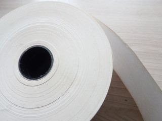 roll of thin white paper for printing on printer