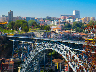 Porto, Portugal - July 18, 2019: Dom Luis I bridge and Vila Nova de Gaia seen from Porto.