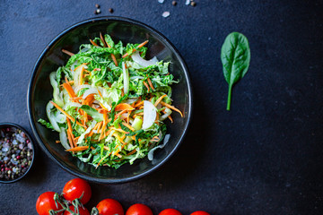 vegetables salad snack Peking cabbage savoy, onion, carrot, pepper and other vegetarian serving size top view place for text copy space keto or paleo diet raw
