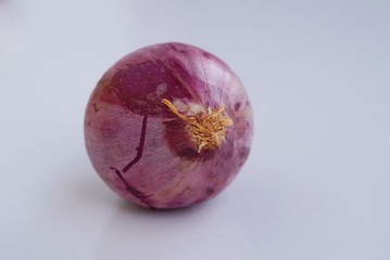 Purple onion on white background. Organic onion.
