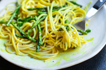spaghetti green bean asparagus sauce cheese pasta second course vegetarian serving portion size top view copy space for text
