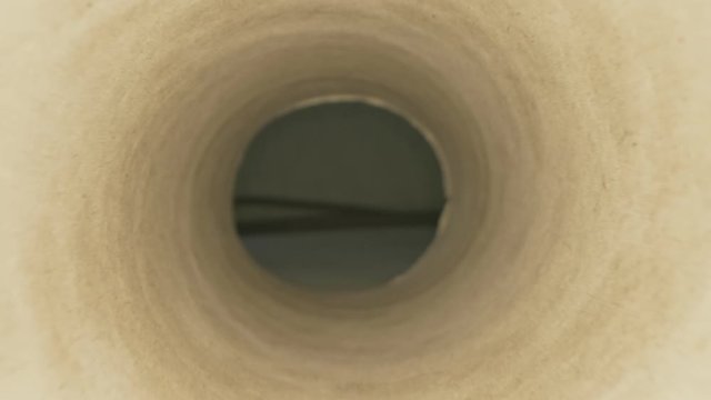 super close up. macro shot inside a hollow cardboard tube