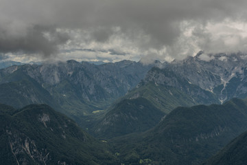 Fototapeta premium View to Slovenia from path to Mittagskogel hill in cloudy summer day
