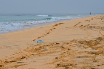 Plastic bottle on the beach.