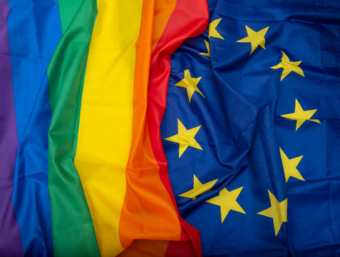 Fabric European Union EU and Rainbow flags, concept picture about human rights