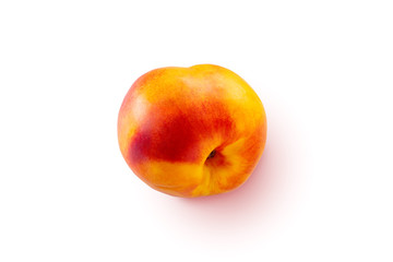 One ripe nectarine isolated on white background with a clipping path