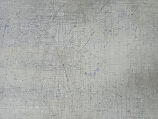 Scratched white texture. Light background with scratches