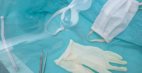 Plakat Medical gloves, mask, glasses in surgery.